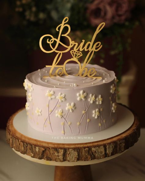 Whimsical lilac with a touch of daisy magic 🌸💜 Celebrating the beautiful bride-to-be with a cake as dreamy as her big day! #Bridetobe #LilacLove #DaisyDreams #WeddingVibes #BakingWithLove Bride To Be Cakes Ideas, Bride To Be Ideas, Bride To Be Decoration Ideas, Miss To Mrs Cake, Whimsical Cakes, Bride To Be Cake, Bride To Be Decorations, Second Birthday Cakes, Bachelorette Cake