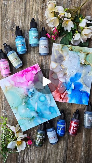 Ranger Ink (Official) on Instagram: "🎨✨ Watch @luv2papercraft create some fabulous backgrounds with the new @tim_holtz Alcohol Ink colors! 🌟 Color combos are as follows: 🖌️ First panel: Cosmopolitan, Smudge, Bayou, Juniper, and Chronicle. 🖌️ Second panel: Wilderness, Flannel, Yonder, Brick, and Gravel. Get inspired by these stunning hues! 🌈💫   Supplies: Tim Holtz ® Alcohol inks :  Cosmopolitan, Brick, Wilderness, Bayou, Yonder, Chronicle, Smudge, Flannel, Gravel and Juniper Tim Holtz Distress®  Paint: Black Soot, Picket Fence Tim Holtz ® Alcohol Ink Yupo White Ranger Heat It™ Craft Tool Ranger Artist Brush Tim Holtz Distress® Splatter Brush Tim Holtz ® Alcohol Ink Blower Tim Holtz® by Tonic Studios Surface Media Mat   Instructions: 1️⃣Add some isopropyl alcohol onto the Yupo paper an Distress Ink Techniques, Ink Splatter, Tim Holtz Distress Ink, Yupo Paper, Artist Brush, Ranger Ink, Alcohol Ink Painting, Distressed Painting, Craft Tools