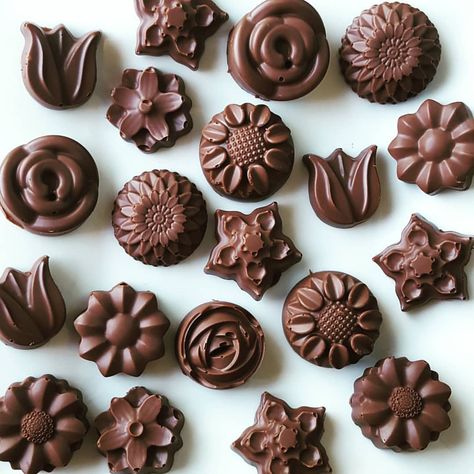 Chocolate peanut butter flower cupcake toppers...hard to resist eating these! Flower Shaped Chocolate, Chocolate Lace Flower, Hard Chocolate Shell, Flower Cupcake Toppers, Flower Cupcake, Flower Cupcakes, Chocolate Peanuts, Chocolate Peanut Butter, Cupcake Toppers