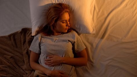 Young woman sleeping in white comfortable bed with brown blanket, top-view October New Moon, Cycle Of The Moon, Licensed Clinical Social Worker, Employee Management, Night Terror, Trouble Sleeping, Moon Cycles, Sleeping Habits, Sleep Pattern