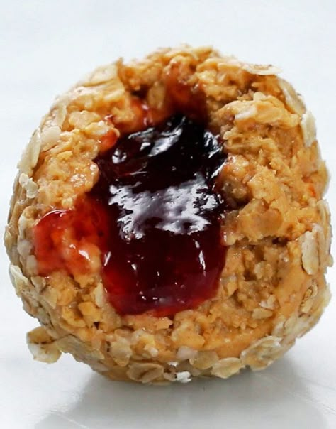 Jam-Stuffed Peanut Butter Balls Starch Sides, Peanut Butter Pancakes, Peanut Butter Balls Recipe, Tasty Desserts, Butter Balls, Peanut Butter Balls, Köstliche Desserts, Balls Recipe, Yummy Food Dessert