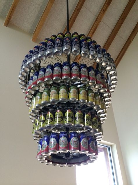 Beer can chandelier from bike wheels Beer Can Chandelier, Can Chandelier, Beer Can Art, Brewery Decor, Recycled Cans, Pub Ideas, White Trash Party, Trash Party, Bottle Chandelier