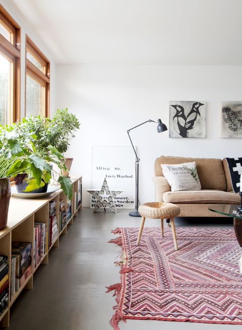 Inside a Carefully Curated European Home via @MyDomaine Long Low Bookcase, Low Bookshelves, Lots Of Plants, Boho Nails, Low Bookcase, European Home Decor, Wicker Decor, Living Room Shelves, Industrial Modern