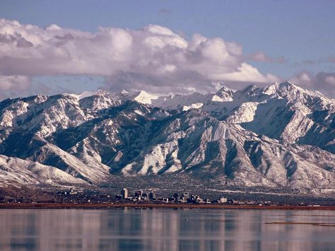 "A Different View"  Salt Lake City, photo taken from south east shore of Antelope Island in the Great Salt Lake.  Utah has, on average, the tallest mountains of all the states.  High Uintahs get to 13,000 feet. Wasatch Mountains Utah, Great Salt Lake Utah, Utah Nature, Utah Trip, Great Salt Lake, Yellowstone Trip, Antelope Island, Texas Places, Mountains Snow