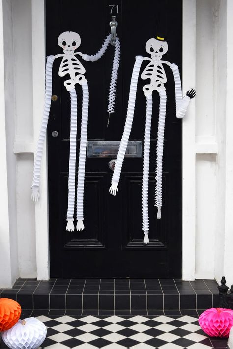 There's no bones about it! Mr. and Mrs. Skeleton are are sure to add the perfect amount of fright to your Halloween party. Perfect to hang on your front door or to hang from the ceiling. Purchase includes one pack of 2 honeycomb skeletons Dimensions: skeletons are 3.3' L Paper Halloween Decorations, Charm Party, Halloween Skeleton Decorations, Honeycomb Decorations, Pumpkin Garland, Trick Or Treaters, Skeleton Decorations, Halloween Balloons, Halloween Tableware