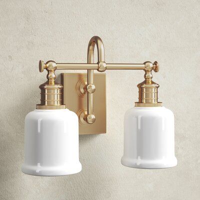 Fixture’s combination of strength and refinement is equally at home in a country manor or an urban apartment. We double-mount the sconce’s gooseneck arm to create a durable and appealing design. Bell-shaped glass, cast swivels, and straight-line knurling on the socket holders enhance vintage character. Color: Aged Brass | Birch Lane™ Larocque 2 - Light Vanity Light Glass in Yellow, Size 11.0 H x 13.5 W x 8.0 D in | Wayfair | Black Friday / Cyber Monday Deals Milk Glass Light Fixture Bathroom, Double Vanity Lighting, Modern Bathroom Design Lighting, Bathroom Vanity Lights, Country Manor, Light Fixtures Bathroom Vanity, Urban Apartment, Bathroom Ceiling Light, Industrial Hardware