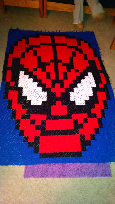 Finally finished Spiderman... It's almost 5'x6' and definitely the most epic blanket I've crocheted to date. Spiderman Granny Square, Spiderman Blanket Crochet Free Pattern, Crochet Spiderman Blanket, Spiderman Crochet Blanket, Free Crochet Spiderman Blanket Patterns, Spiderman Granny Square Blanket, Crochet Super Hero Blanket, Spider Man Crochet, Batman Granny Square Crochet Blanket