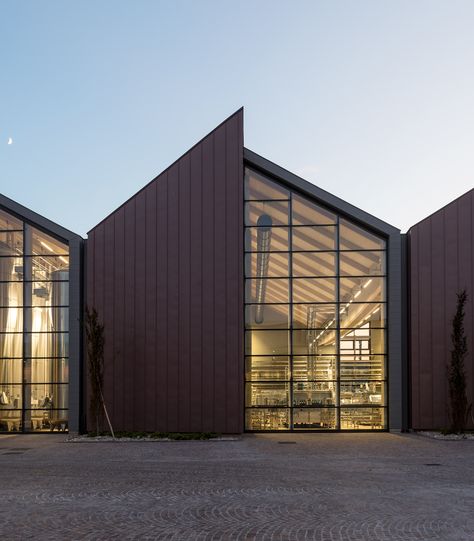 Row of ridged bays contains bottling facilities at Santa Margherita vineyard Modern Industrial Building Facade, Warehouse Architecture Design, Modern Warehouse Exterior, Warehouse Design Architecture, Modern Warehouse Design Exterior, Modern Warehouse Design, Warehouse Design Exterior, Industrial Building Facade, Industrial Exterior Design