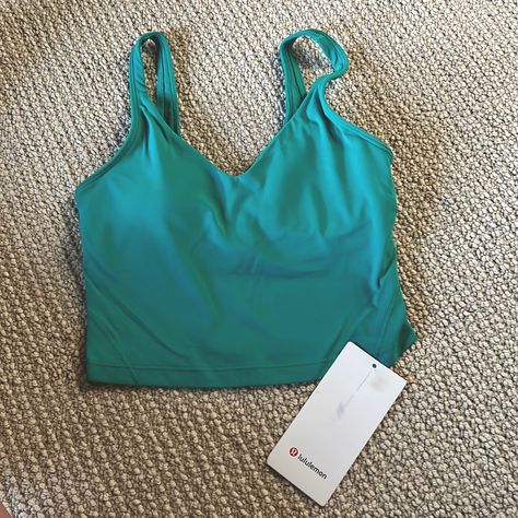 Teal Lululemon Tank. Size 4. New With Tags Preppy Tank Tops, Lululemon Sports Bra Tanks, Sweats Set, Lululemon Collection, Teal Tank Top, Lululemon Tank Top, Lululemon Tops, Lululemon Tank, Lululemon Outfits