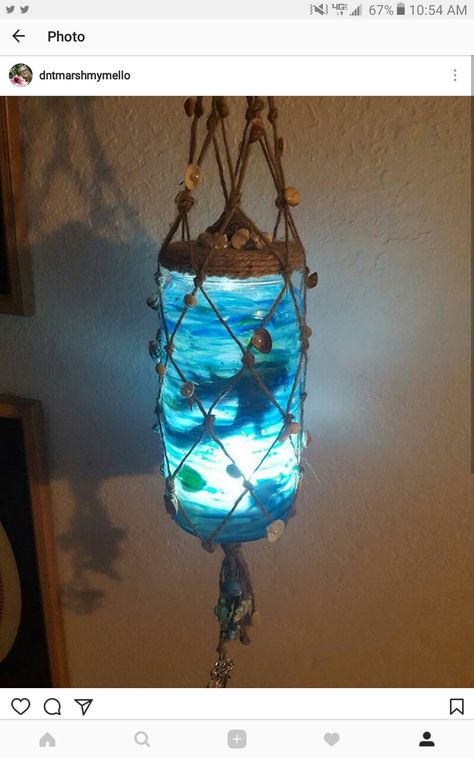 Mermaid fairy lanterns. Soothing underwater vibes for a nightlight in the bathroom. Nautical themed decor. Has shells and charms added to the fishing net hanger. Follow me on Instagram @dntmarshmymello Underwater Bathroom Theme, Mermaid House Underwater, Mermaid Theme Bathroom, Mermaid Lantern, Mermaid House, Sea Decoration, Mermaid Lamp, Ocean Themed Bathroom, Ocean Bathroom