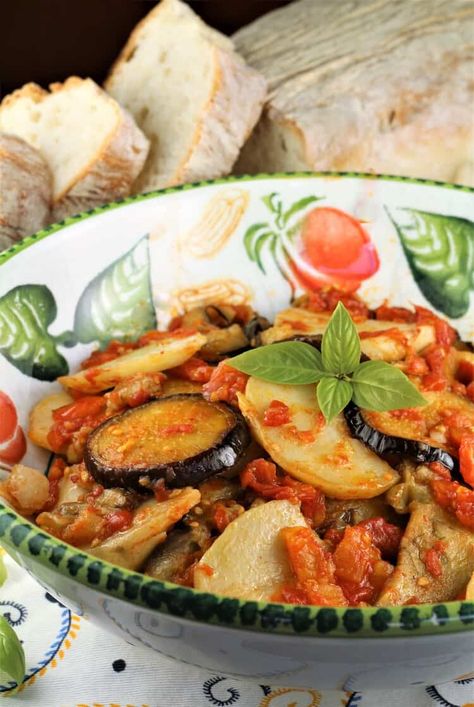 bowl of eggplant, potatoes and tomato sauce with bread in background Perfect Potatoes, Baked Dish, Peasant Food, Baked Eggplant, Easy Slow Cooker Recipes, Italian Recipes Authentic, Easy Slow Cooker, Roasted Vegetables, Apple Recipes