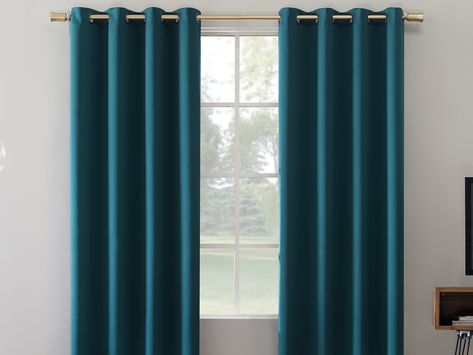 Sun Zero Oslo Blackout Window Curtain provides the ultimate in light blocking technology to keep out even the harshest of light while bringing an elegant urban sophistication to any room of your home. Sun Zero Extreme Blackout technology is laboratory tested to block out 100% of light reduce outside noise by up to 45% and decrease energy lost through your windows by up to 50%. Comfort is optimized with thermal properties that help keep summer heat and winter chill out of your home. | Sun Zero Bl Teal Curtains, Sun Zero, Grommet Panels, Energy Efficient Design, Darkening Curtains, Room Darkening Curtains, Colorful Curtains, Grommet Curtains, Room Darkening