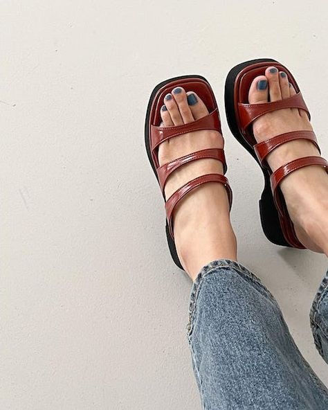 7 Fall 2023 Pedicure Trends Every Stylish Person Is Wearing 2023 Pedicure Trends, Pedicure Trends, Trends Fall 2023, 2023 Pedicure, Fall Pedicure, Nude Polish, Pedicure Colors, Fashion Staples, Gel Couture