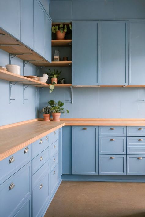 A sleek kitchen with Japandi-style blue kitchen cabinets and minimalist wooden shelves for an elegant look. Color Tile Backsplash, Blue Gray Kitchen Cabinets, Grey Blue Kitchen, Home Office Closet, Colorful Backsplash, 6 Bedroom House, Home Design Software, Porch House Plans, Blue Kitchen Cabinets