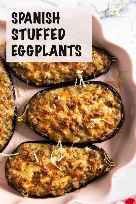 Spanish Stuffed Eggplants (Berenjenas Rellenas) combine the earthiness of roasted eggplants with the smokiness of Spanish spices in the ground meat.  Baked to golden perfection, they're a delicious and flavor-packed main course dish --- an undeniable complex mix of flavors in every bite! Stuffed Aubergine, Aubergine Recipe, Main Course Dishes, Spanish Cuisine, Eggplant Recipes, Ground Meat, Food Platters, Turkish Recipes, Ground Pork