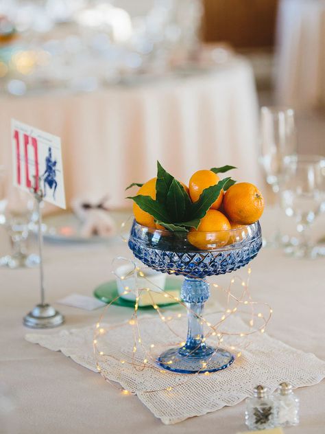 Orange you glad you didn't use flowers? (Sorry, we had to.) Fill glasses, vases or bowls with citrus for naturally colorful focal points. Non Floral Wedding Centerpieces, Non Flower Centerpieces, Floral Wedding Centerpieces, Milk Glass Centerpiece, Non Floral Centerpieces, Wedding Reception Tablescapes, Centrepiece Ideas, Beautiful Wedding Centerpiece, Pink Thanksgiving