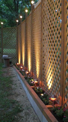 Lattice panel fence with mood lighting Privacy Fence Designs, Lattice Fence, Backyard Privacy, Privacy Screen Outdoor, Outdoor Privacy, Landscape Designs, Fence Decor, Backyard Fences, Wood Fence