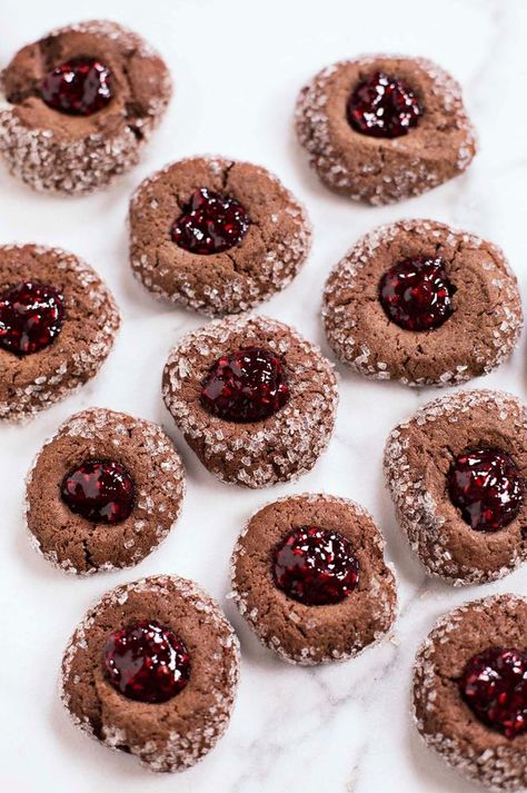 Chocolate Thumbprint Cookies with Red Wine Raspberry Jam | A Beautiful Mess | Bloglovin’ Quick Christmas Cookie Recipe, Thumbprint Cookies Christmas, Raspberry Thumbprint Cookies, Chocolate Thumbprint Cookies, Jam Thumbprint Cookies, Easy Holiday Treats, Cookie Cookbook, Best Christmas Cookie Recipe, Butter Cupcakes