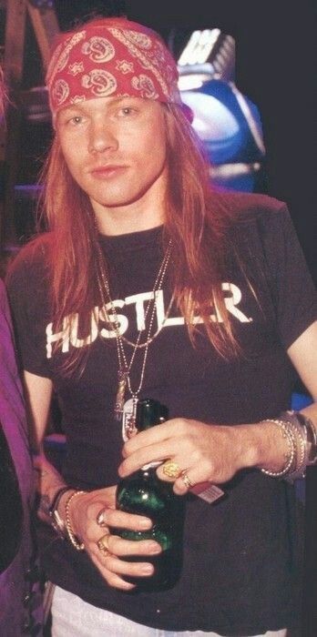 AXL ROSE of GUNS AND ROSES with HUSTLER T-shirt “The World’s No:1 Online Heavy Metal T-Shirt Store”. Check it out our Metalhead Clothing and Apparel Store, Satanic Fashion and Black Metal T-Shirt Stores; www.HeavyMetalTshirts.net Axel Rose Costume, Rose Costume, Axel Rose, Hair Metal Bands, Metal T Shirts, Costume Women, Axl Rose, I'm With The Band, Random Photos