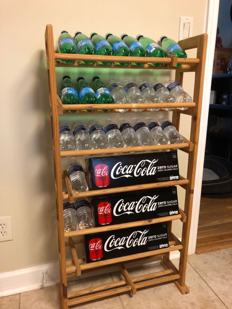 Originally a DC rack but used as a shoe rack for years, and now as a soda / water holder. Shoe Rack To Hold Water Bottles, Soda Organization, Drinks Storage Ideas, Water Bottle Rack, Drink Organizer, Drink Storage Ideas, Shoe Rack Hacks, Easy House Cleaning, Diy Counter