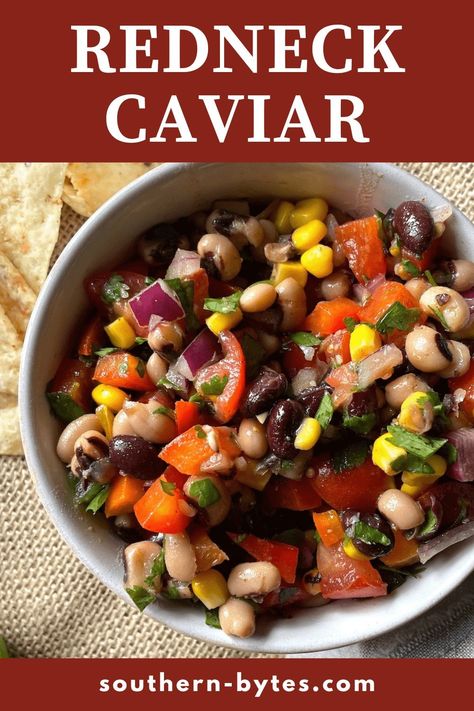 Redneck Caviar is a Southern Dip and Side Dish made with fresh vegetables & a delicious vinegar dressing. Black-Eyed Peas & Black Beans are tossed with fresh summer tomatoes, peppers, and corn and you won’t be able to resist scooping a chip in this dip! Cowboy Caviar Recipe, Southern Side Dishes, Cherry Tomato Plant, Canning Sweet Corn, Caviar Recipes, Cooking Dried Beans, Cowboy Caviar, Vinegar Dressing, Italian Salad Dressing