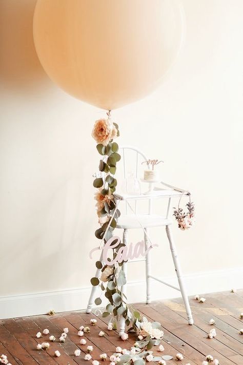 Elegant Balloon | This Haus of Ours wins for most epic first birthday high chair balloon ever! We love how the balloon ribbon was beautified with leaves and... High Chair Decorations, Blush Balloons, First Birthday Themes, 1st Birthdays, Girl First Birthday, First Birthday Party