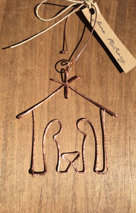 This Manger Scene Ornament is handmade in the Mississippi Delta. This is the perfect Christmas ornament for anyone celebrating the birth of Jesus !  Each ornament is sealed with a spray lacquer.  Measurements: Ornament: (without hanger) approximately 2 1/2 inches by 3 1/2inches  hook: adds approximately 2 inches to the length Wire Nativity Scene, Copper Wire Christmas Ornaments, Copper Wire Ornaments, Wig Jig Patterns Free, Nativity Ornaments Diy, Metal Wire Crafts, Copper Christmas Ornaments, Manger Scene Ornament, Wire Christmas Ornaments