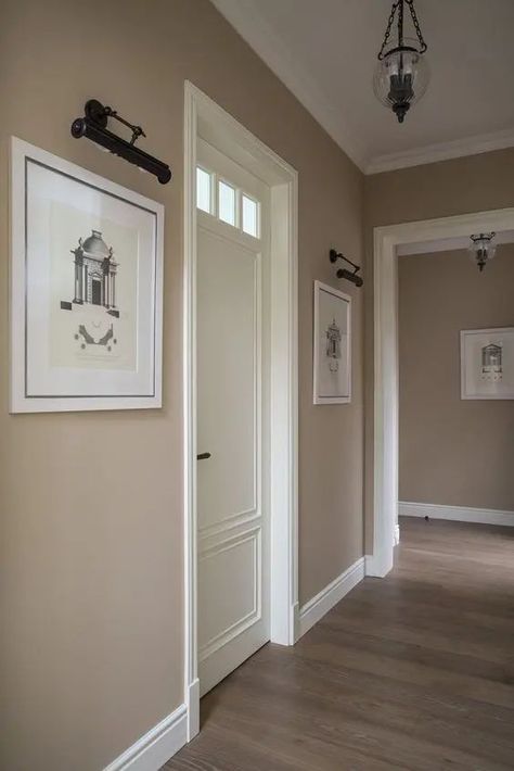 a stylish greige entryway with white touches, artworks and a vintage pendant lamp is a chic space with an elegant color scheme Minimalist Bedrooms, Korean House, Japanese Minimalist, Home Hall Design, Living Room Decor Colors, Dining Design, تصميم للمنزل العصري, Decor Home Living Room, Design Living Room