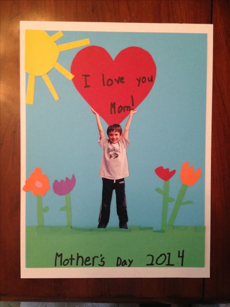 Mother's Day idea. What mom doesn't want a cute cut-out of her kid holding a heart? My first graders cut out all the pieces, and I helped with the gluing. Attach ribbon on the back (using hot glue) so that it can be hung year round! :) Mothers Day Crafts Preschool, Diy Mother's Day Crafts, Mother's Day Projects, Mother's Day Activities, Mothers Day Crafts For Kids, Daycare Crafts, Classroom Crafts, Fathers Day Crafts, Mother's Day Diy