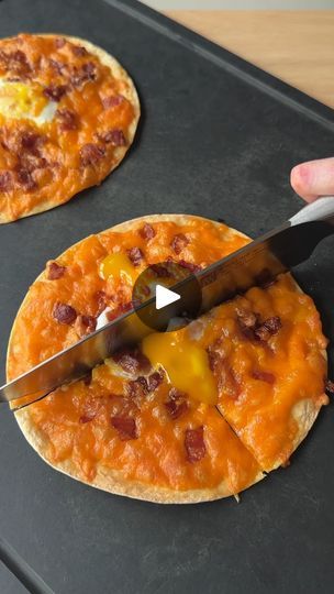 7.5K views · 67 reactions | Air Fryer Tortilla Breakfast Pizzas 🍕🍳🥓 

This is the easiest 4-ingredient breakfast made with Essential Everyday shredded cheddar, eggs, and hardwood smoked bacon. 

Here’s how to make them:

Preheat air fryer to 350˚F. 

Place tortilla in air fryer basket. Top with a layer of Essential Everyday shredded cheddar cheese. Crack an egg in the center. Top with cooked and finely chopped Essential Everyday hardwood smoked bacon. Top with a little more cheese. 

Cook in air fryer for ~3 minutes, until cheese is bubbly and browned and the egg is cooked to your liking. #breakfast #pizza | Essential Everyday Brand | Essential Everyday Brand · Original audio Tortilla In Air Fryer, Cook In Air Fryer, Tortilla Breakfast, Air Fryer Tortilla, Breakfast Pizzas, Shredded Cheddar Cheese, Breakfast Pizza, 4 Ingredient, Smoked Bacon