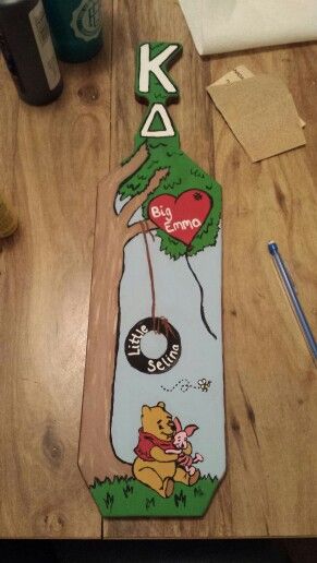 My big's winnie the pooh paddle I made her. Kappa Delta Winnie The Pooh Sorority Paddle, Sorority Gifts Diy, Paddle Sorority Big, Big Little Paddles, Sigma Lambda Gamma, Paddle Ideas, Kappa Kappa Psi, Sorority Paddles, Sorority Canvas