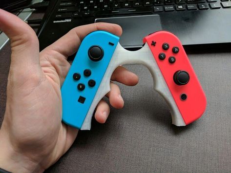 Image of Nintendo Switch Mods to 3D Print: Switcherang Joy-Con Grips #Nintendocharacters 3d Printer Designs, Video Game Rooms, 3d Printing Diy, Nintendo Switch Accessories, 3d Printed Objects, 3d Printing Projects, Game Controllers, Video Game Controller, Gamer Room