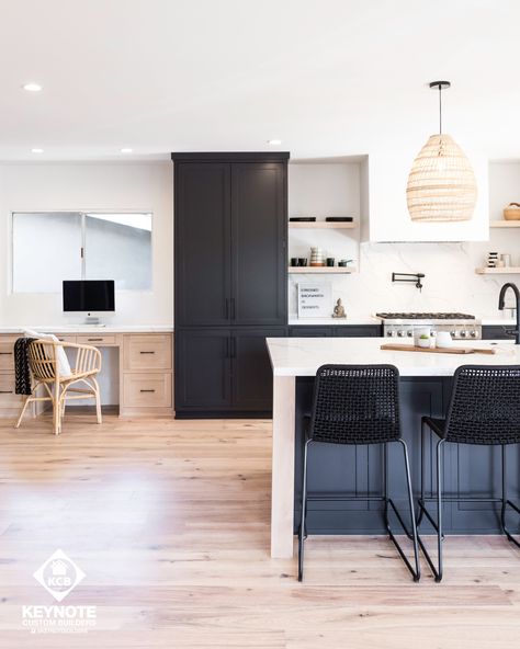 Black Waterfall Island, White Oak And Black Kitchen, Drywall Hood, Black Island Kitchen, Black And Oak Kitchen, Kitchen White Oak, White Oak Floating Shelves, Black White Kitchen Decor, Modern Organic Kitchen