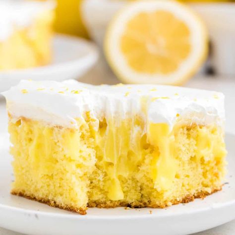 Lemon Poke Cake is a sweety and tangy dessert recipe made with boxed lemon cake mix, lemon instant pudding mix and Cool Whip. Marshmallow Poke Cake, Poke Cake Lemon, Lemon Pudding Cake, Moist Lemon Cake, Cake Lemon, Lemon Dessert, Lemon Cake Mixes, Lemon Cake Recipe, Lemon Dessert Recipes