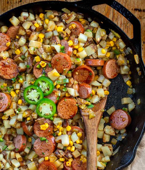 Campfire Hash, also known as kielbasa hash, is a flavorful and hearty dish that brings together a variety of ingredients to create a satisfying one-pan meal. It is a comforting and enjoyable meal loaded with smoked sausage, potatoes, and vegetables, reminiscent of outdoor gatherings and campfire cooking! Campfire Hash, Smoked Sausage Potatoes, Potatoes And Vegetables, Kielbasa Recipes, Dinner Choices, Hearty Lunch, Hash Recipe, Grated Potato, Breakfast Hash