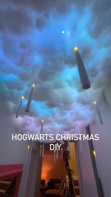 Danny Valimaki on Instagram: "Going a bit ham on the vibes this holiday. DIYed a Hogwarts floating candle hallway. JMTONE Floating Candles with Wand, 20 PCs https://a.co/d/fIuWy2B" Floating Ceiling Candles, Harry Potter Night Sky Ceiling, Decorating Ceiling For Christmas, Hogwarts Ceiling Diy, Harry Potter Ceiling Clouds, Hanging Clouds From Ceiling Diy, Hogwarts Christmas Party, Hogwarts Ceiling, Christmas Decor Hallway