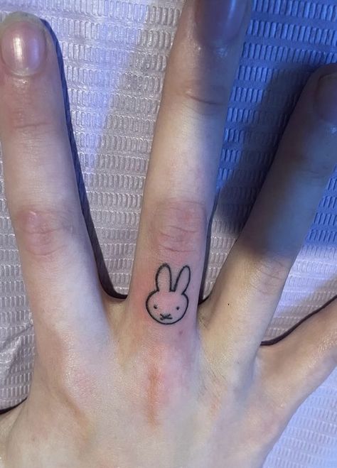 Miffy Tattoo Small, Tattoo Ideas Finger, Miffy Tattoo, Cake Tattoo, Fingers Tattoo, Finger Tattoo Ideas, Stick Poke Tattoo, Bunny Tattoo, Cute Finger Tattoos