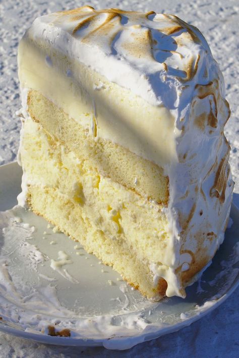 A gluten free lemon ice cream cake with meringue frosting that your family will LOVE. This recipe is perfect for birthdays or celebrations and is easier than it looks to make at home. | thefrayedapron.com #icecreamcake #lemonicecream #meringuefrosting Gluten Free Ice Cream Cake Recipes, Lemon Meringue Ice Cream, Lemon Custard Ice Cream, Gluten Free Ice Cream Cake, Meringue Ice Cream, Cherry Cake Recipe, Gluten Free Vanilla Cake, Custard Ice Cream, Meringue Desserts