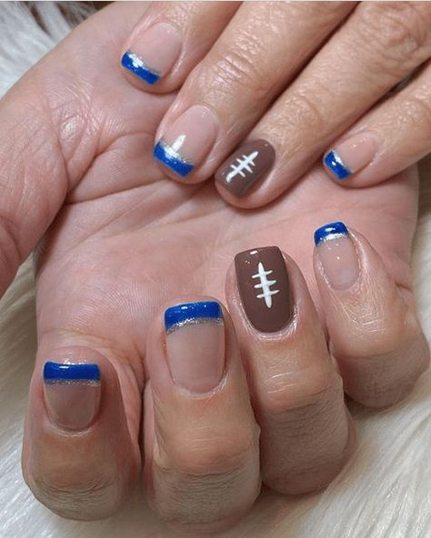 2024's Trendiest Football Nail Designs - Show Your Team Spirit in Style Nail Ideas Football, Team Nails Sports, Nails For Football Season, Football Nail Art Designs, Football Season Nail Designs, Lions Nails Detroit, Detroit Lions Nails Ideas, Football Nail Designs Nfl, Fall Football Nail Designs