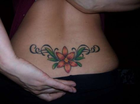 Faith Tattoo Designs, Girly Tattoo, Lower Back Tattoo Designs, Lower Back Tattoo, Lily Tattoo Design, Flower Spine Tattoos, Lily Flower Tattoos, Girl Back Tattoos, Tattoo Back