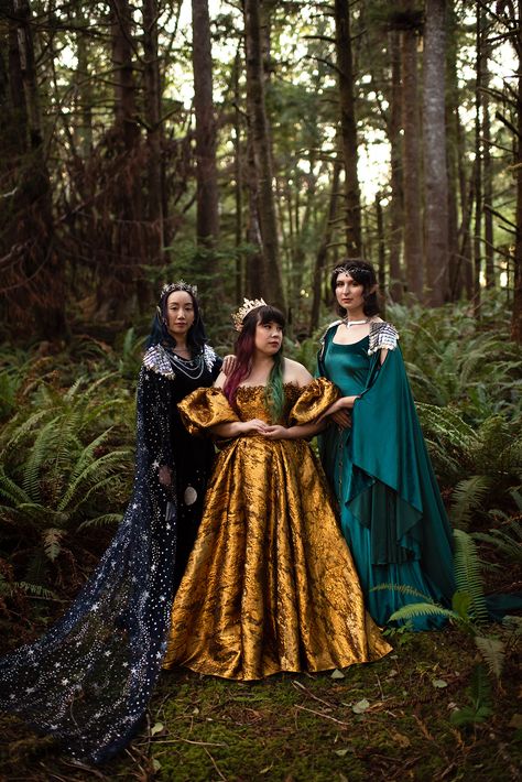 3 elves in jewel tone dresses stand together in a lush green forest Elven Aesthetic, What Is A Dream, Character Posing, Fantasy Photoshoot, What Are Dreams, Love No Matter What, Fantasy Portraits, Fantasy Wedding, Before Sunset