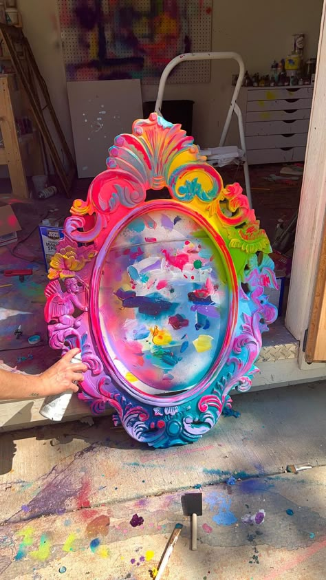 Ann Upton Art on Instagram: “Really, really, really, ridiculously good looking Angel & Rainbow frame 😏 ✨ Derek Zoolander approved really, really, really, ridiculously…” Funky Room Decor Vintage, Funky Picture Frame, Rainbow Mirror Frame, Rainbow Vanity, Painted Mirror Frame, Rainbow Bedroom Decor, Mirror Upcycle, Upcycled Mirror, Rainbow Furniture