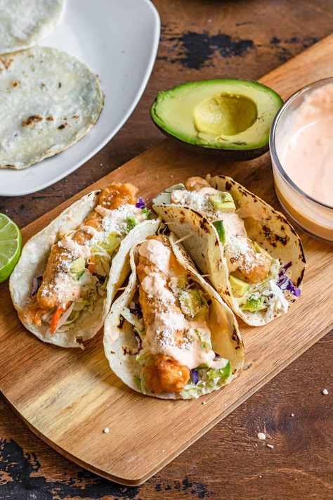 Tacos de Pescado are delicious fish tacos from Baja California. Bring a little bit of Mexico into your home with this easy Tacos de Pescado recipe! Easy Tacos, Fish Tacos, Good Eats, Tacos, California, Fish, Mexico