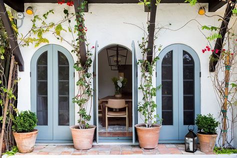 Inside a 1927 Spanish-Style Home in West Hollywood, Los Angeles Spanish Bungalow Front Door, Spanish Home Windows, Spanish Galley Kitchen, Spanish Revival Mid Century, Spanish Style French Doors, Mcm Spanish Home, Spanish Style Homes Front Yard, California House Style, Spanish Bungalow Exterior