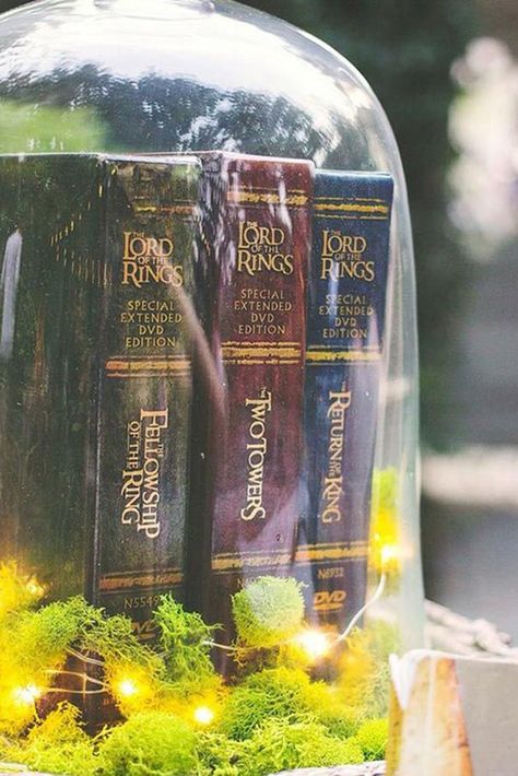 Book Wedding Centerpieces, Lord Of The Rings Decor, Middle Earth Wedding, Wedding Centerpieces Ideas, Hobbit Wedding, Non Floral Centerpieces, Lotr Wedding, Book Centerpieces, Wedding Table Themes