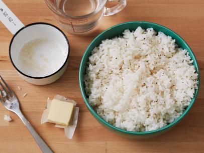 Perfect Microwave Rice Recipe | Food Network Microwave Rice Recipes, Rice Recipe Ideas, Rice In Microwave, Baked Brown Rice, Rice In The Microwave, Microwave Rice, Coconut Rice Recipe, Brown Rice Recipes, Emeril Lagasse