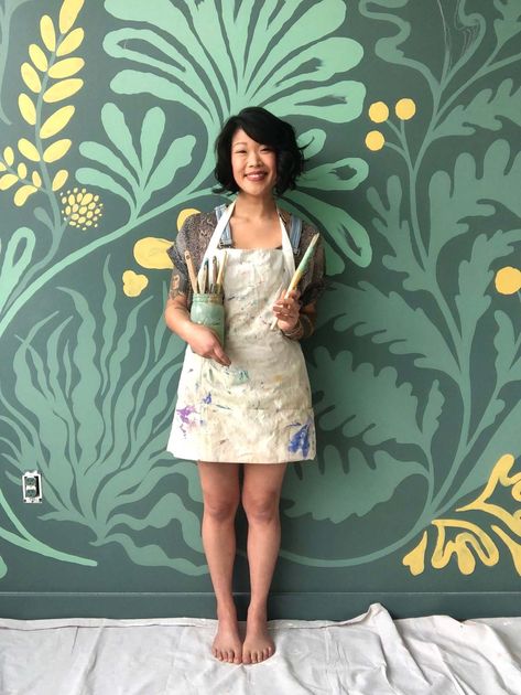 Asian woman wearing artist apron standing in front of a floral mural Lauren Hom, Diy Kitchen Makeover, Bathroom Mural, Wall Murals Diy, Diy Mural, Interior Murals, Garden Mural, Kitchen Diy Makeover, Mural Design