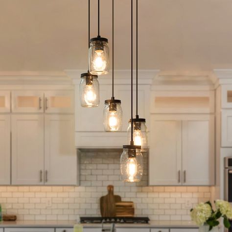 Gracie Oaks Carlile 5 - Light Cluster Jar Pendant | Wayfair Eclectic Kitchen Island Lighting, Modern Farmhouse Island Lighting, Farmhouse Lighting Fixtures, Rustic Farmhouse Light Fixtures, Farmhouse Style Lighting Fixtures, Trailer House, Farmhouse Style Lighting, Mason Jar Kitchen, Mason Jar Chandelier