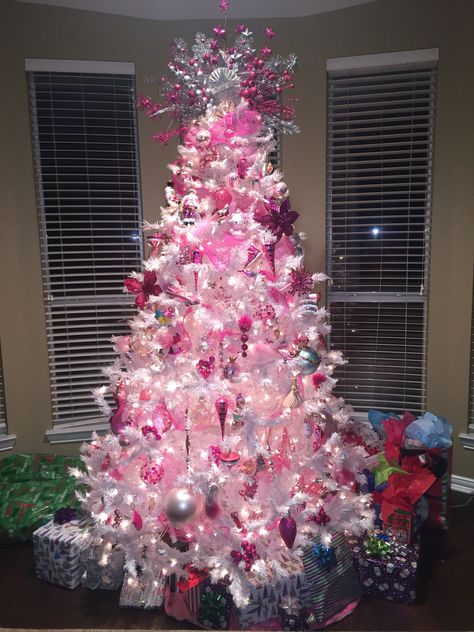 White tree with all pink ornaments. Sliver Pink Christmas Tree, Decorations For Pink Christmas Tree, White Christmas Tree Pink Ornaments, White Tree Pink Ornaments, Christmas Tree Ideas 2022 Trends Pink, Bright Pink Christmas Tree, Pink Christmas Tree Ideas Decorating, Pink Tree Topper, White Christmas Tree With Pink Decor