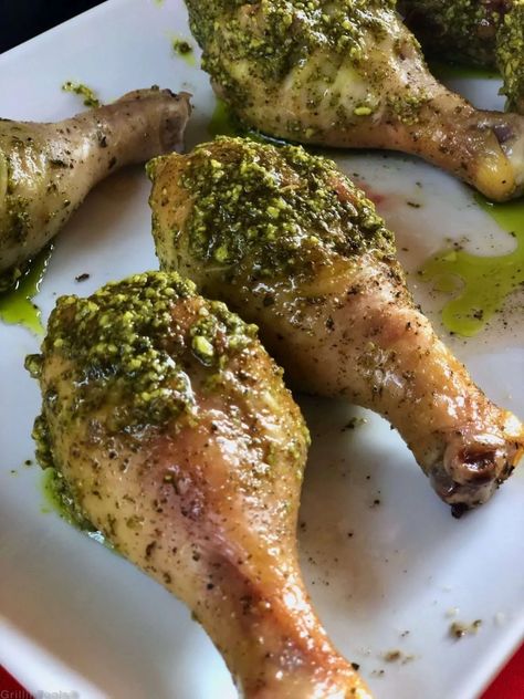 Basil Pesto Chicken Legs One Sheet Meal 19 of 36 | GrillinFools Pesto Chicken Legs Recipe, Pesto Chicken Drumsticks, Basil Pesto Chicken, Baked Pesto Chicken, Leg Quarters, Chicken Leg Quarters, Chicken Leg Recipes, Sheet Pan Chicken, Chicken Drumstick Recipes